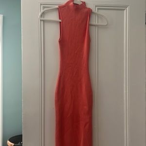 Long peach colored babaton rib dress cut out back